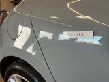 a close up of a car with a sticker on it