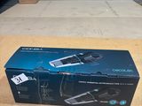 the box of a hair dryer is sitting on the floor