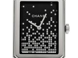a picture of a black and white watch with squares on the face