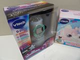 a baby bottle in the box next to the baby bottle