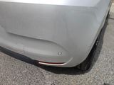 a close up of a car ' s rear bumper with a sticker on it