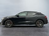 the audi qx is parked in a garage with a grey background