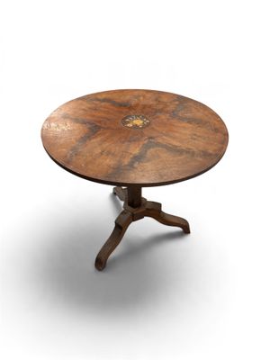 an image of a round table with a wooden top