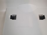a close up of a white electrical outlet on the wall