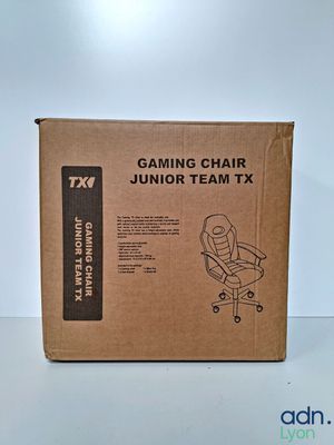 the box for the gaming chair is open and ready to be used