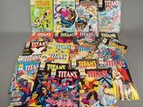 a pile of comic books sitting on top of a table