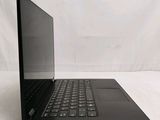 a laptop that is sitting on a white surface