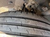 a close up of a tire on the ground