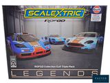 an image of a box of scalextric racing cars in a garage