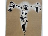 peinture représentant une femme sur une croix, sur un morceau de carton