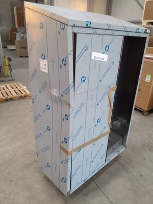 a metal cabinet with a door that has been wrapped up