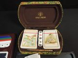 a box with four cards in it on a table