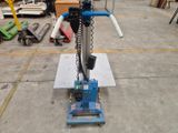 a machine that is sitting on the floor in a warehouse
