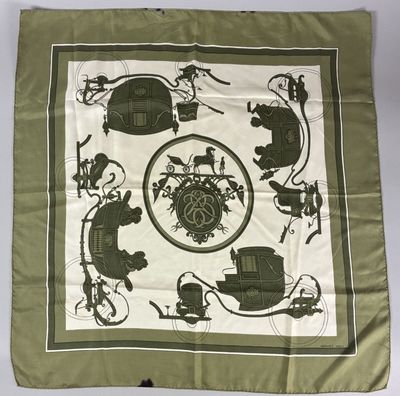 an image of a green and white scarf with a picture of a horse and carriage
