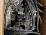 a box with a bunch of hoses inside of it