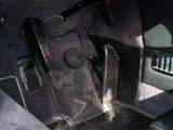 a picture of the inside of a car with the door open