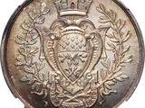 an image of a silver coin with a coat of arms on it