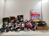 several boxes of assorted items sitting on a counter in a room