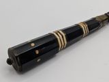 a pen that is sitting on top of a table