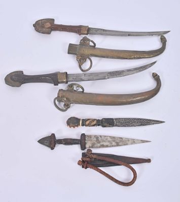 several different types of knives are displayed on a white surface