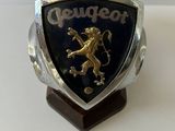 silver and gold plated ring with a lion on it