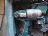 a drill that is sitting in a box
