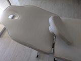 a chair that has a seat on it in a room