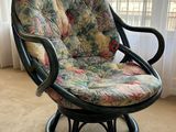 a chair that is sitting in front of a window