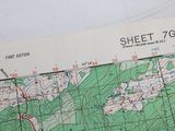 a map of the area on the table with a calculator