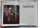 a book with a picture of a man in a tuxedo