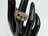 an image of a hand with a ring on it ' s finger
