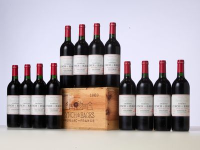 six bottles of red wine in a wooden crate on a table