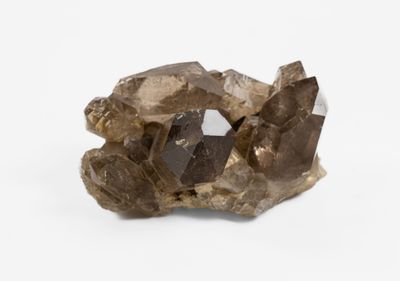 a close up of a piece of rock with a large crystal