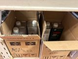 two boxes that have different types of cleaning products in them