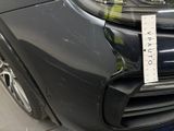 a close up of a car with a sticker on it ' s bumper