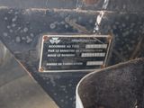 a sign on the side of a black truck