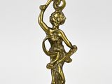 a brass candle holder with a woman holding a bowl on it