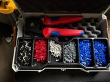 a tool box filled with assorted screws and other tools