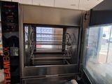 an image of a conveyor belt in a commercial kitchen