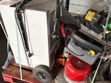 a small machine that is sitting on a pallet