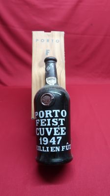a bottle of wine that is sitting on a table