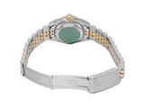 a close up of a watch on a bracelet with a green stone