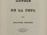 an old book with a black and white title on it