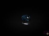 gros plan d'un diamant bleu sur une surface noire