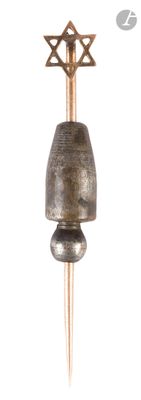 a metal bell with a star of david on it