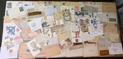 a suitcase full of old postcards and other papers