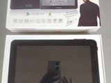 someone is taking a picture of a tablet in a box