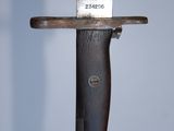 a knife that is sitting on top of a wooden stand