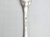 a fork that is sitting on a table