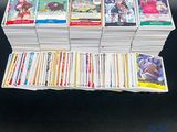a lot of cards that are stacked on top of each other